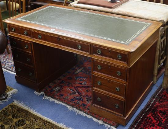 A Victorian mahogany twin pedestal desk